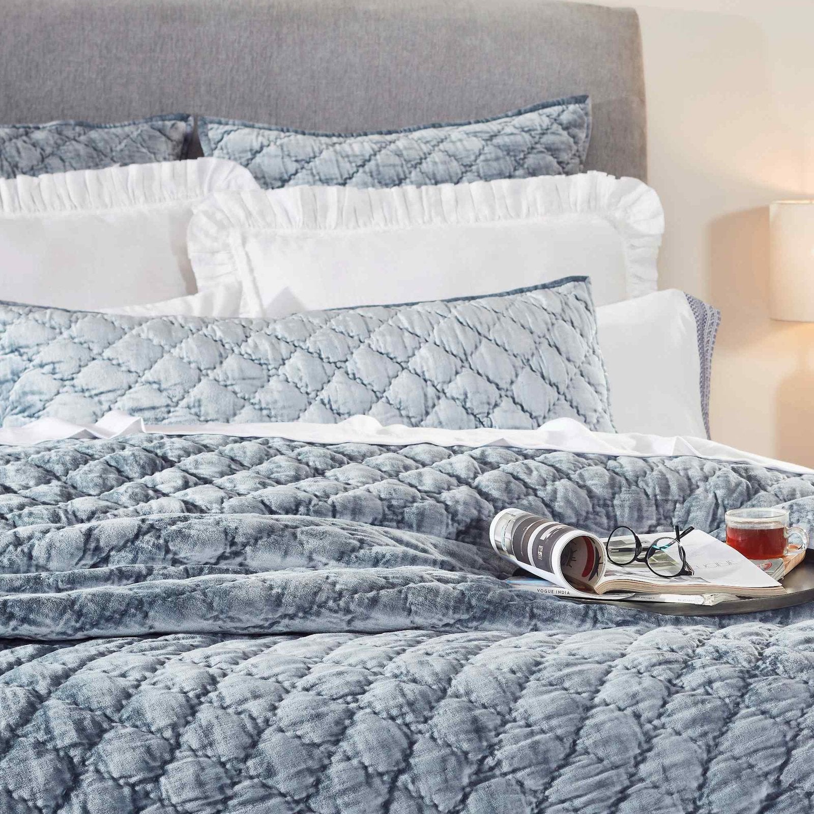 QT-341-11096_5|Close-up of a blue velvet quilted quilt with a diamond pattern, highlighting texture and elegant stitching for comfort.