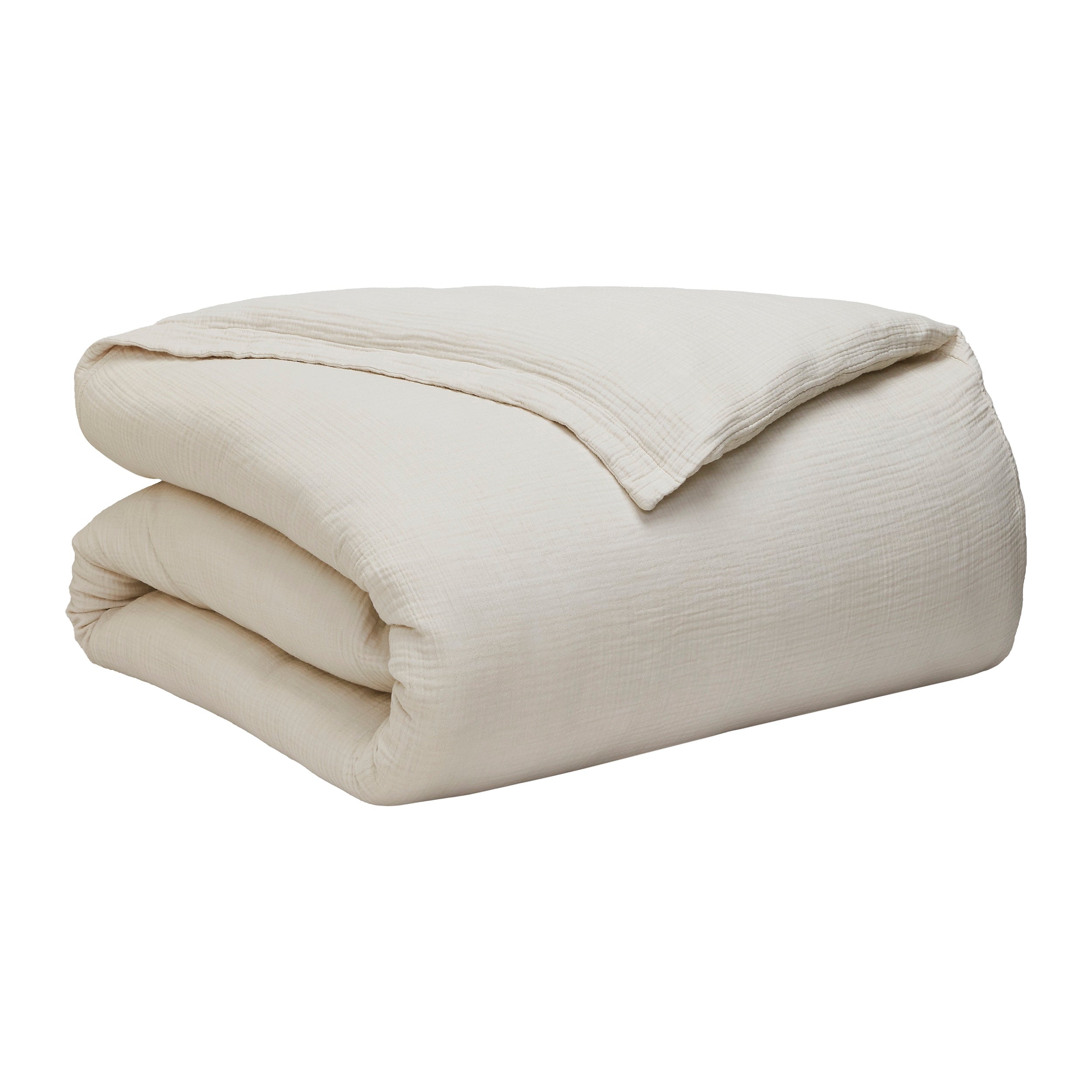 DT-049-10692_10|Folded light cream textured organic cotton gauze duvet cover, showcasing its soft, breathable, and inviting natural fabric.