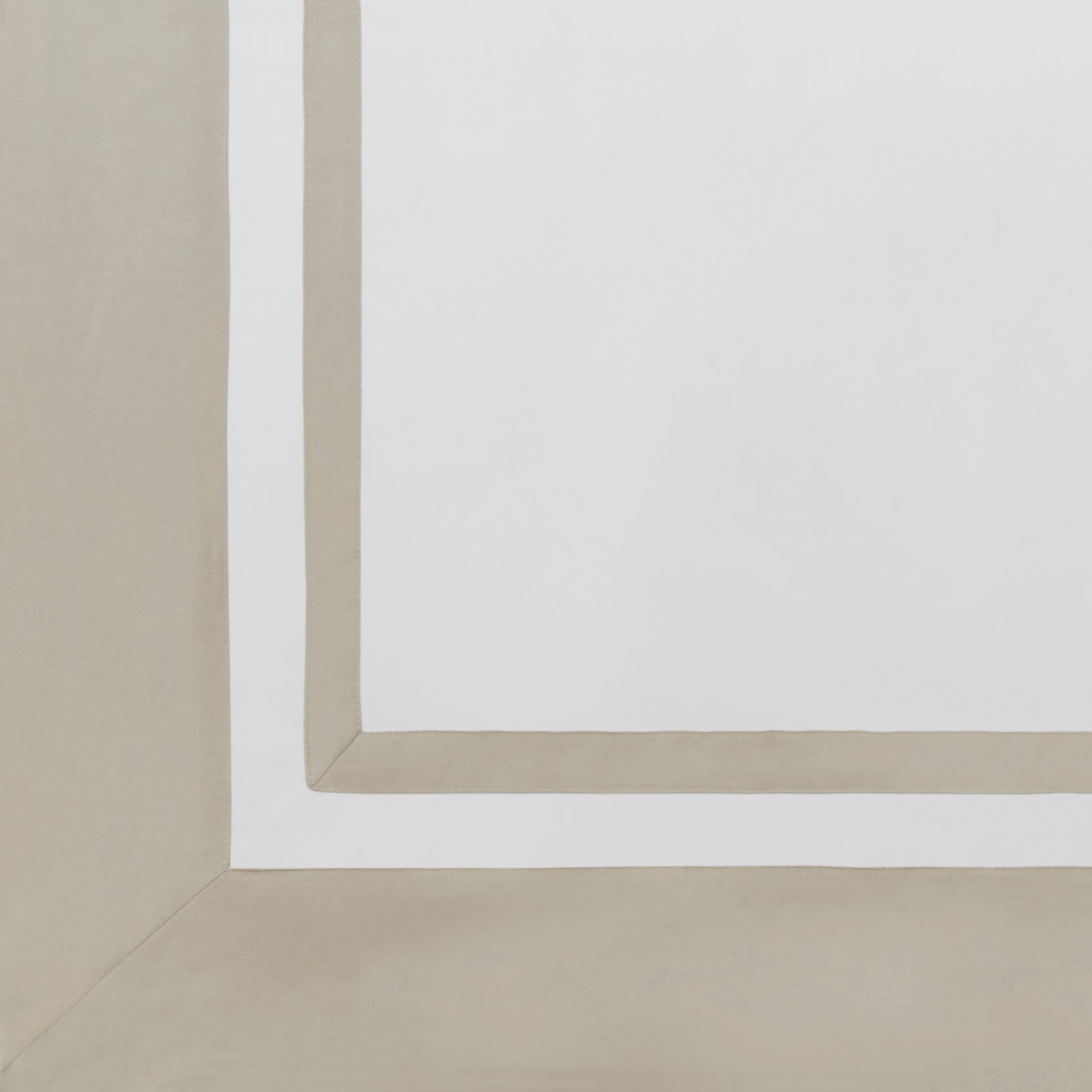 AKP-540-2040_5|Close-up of a white 100% cotton sateen flat sheet with a wide taupe border and a thinner white inner border.