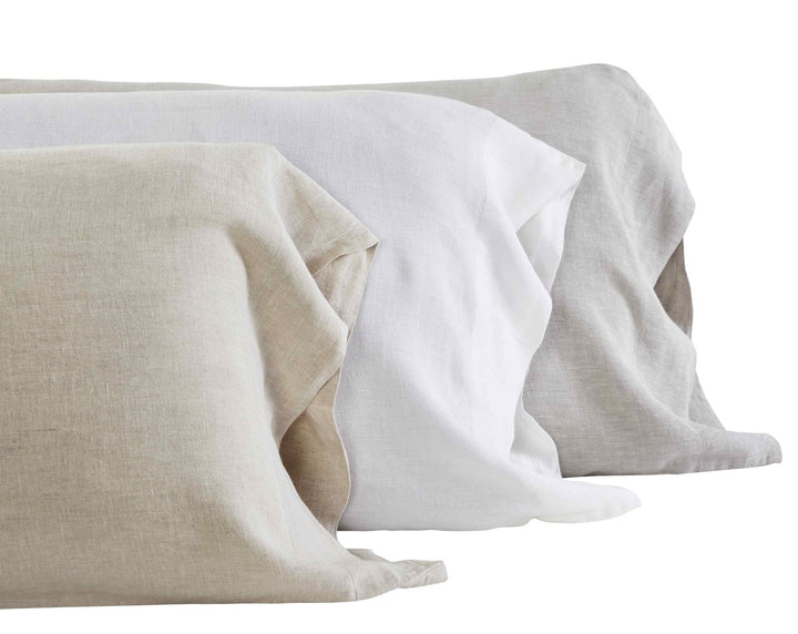 AKP-516-2040_4|Assortment of 100% Linen sheets in natural, white, and light grey shades. Soft, breathable, textured bedding options.