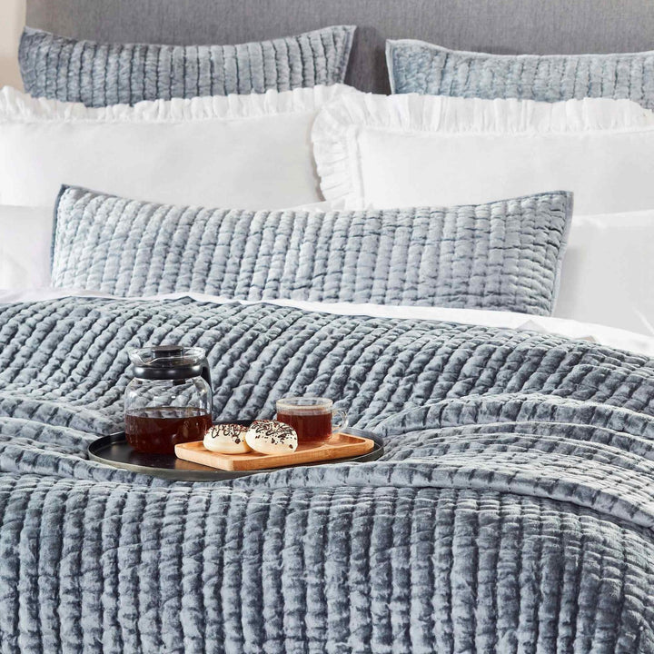 QT-340-11096_4|Close-up of a cozy light blue velvet quilt with a unique textured pattern, perfect for luxurious and inviting bedroom spaces.