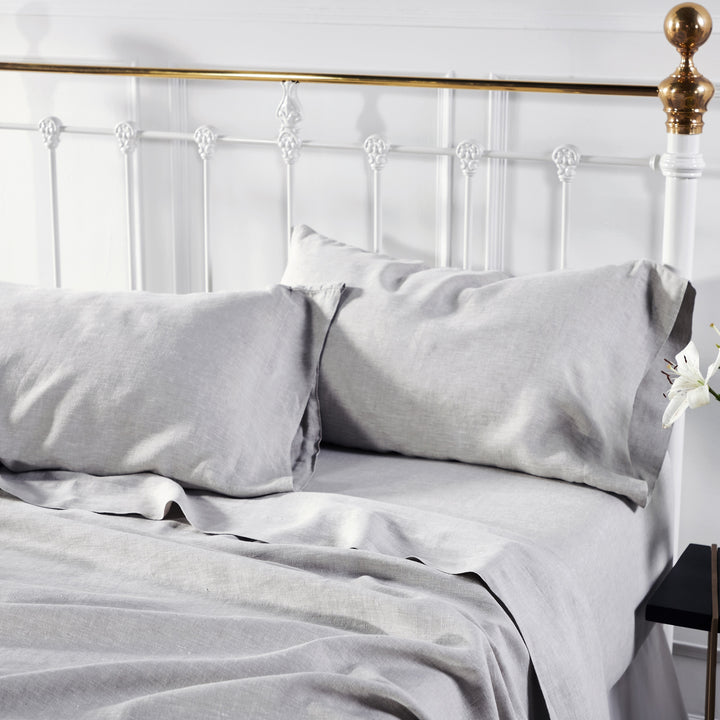 KSS-516-7880_3|Elegant light grey 100% linen sheets and pillowcases on a white bed, providing ultimate softness and durability.
