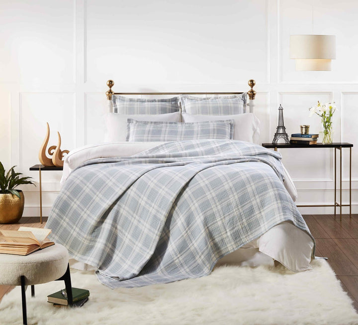 BT-117-11096_1|Elegant light blue and white plaid blanket beautifully draped on a bed, bringing a fresh, serene feel to the room.
