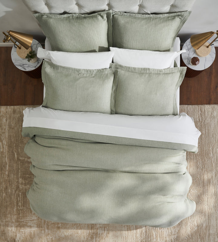 DT-051-9092_5|Overhead view of a cozy bed with sage green textured cotton duvet cover and matching shams, creating serene bedroom decor.
