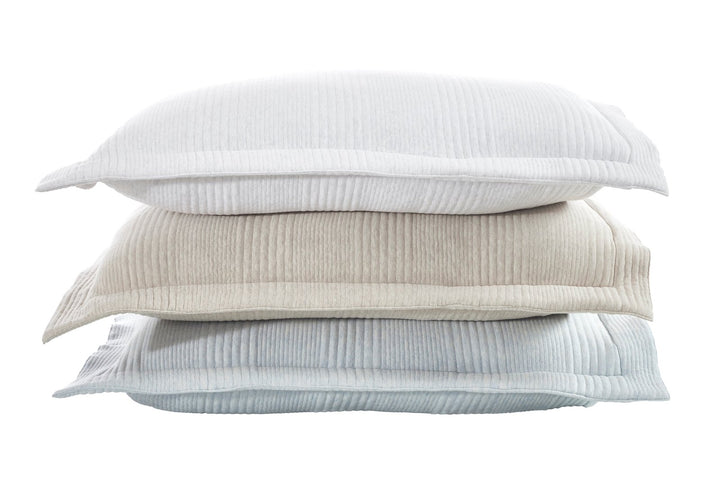 SS-039-X_2|Stack of three soft crinkled pillow shams in white, beige, and light blue, providing comfortable, textured bedding options.