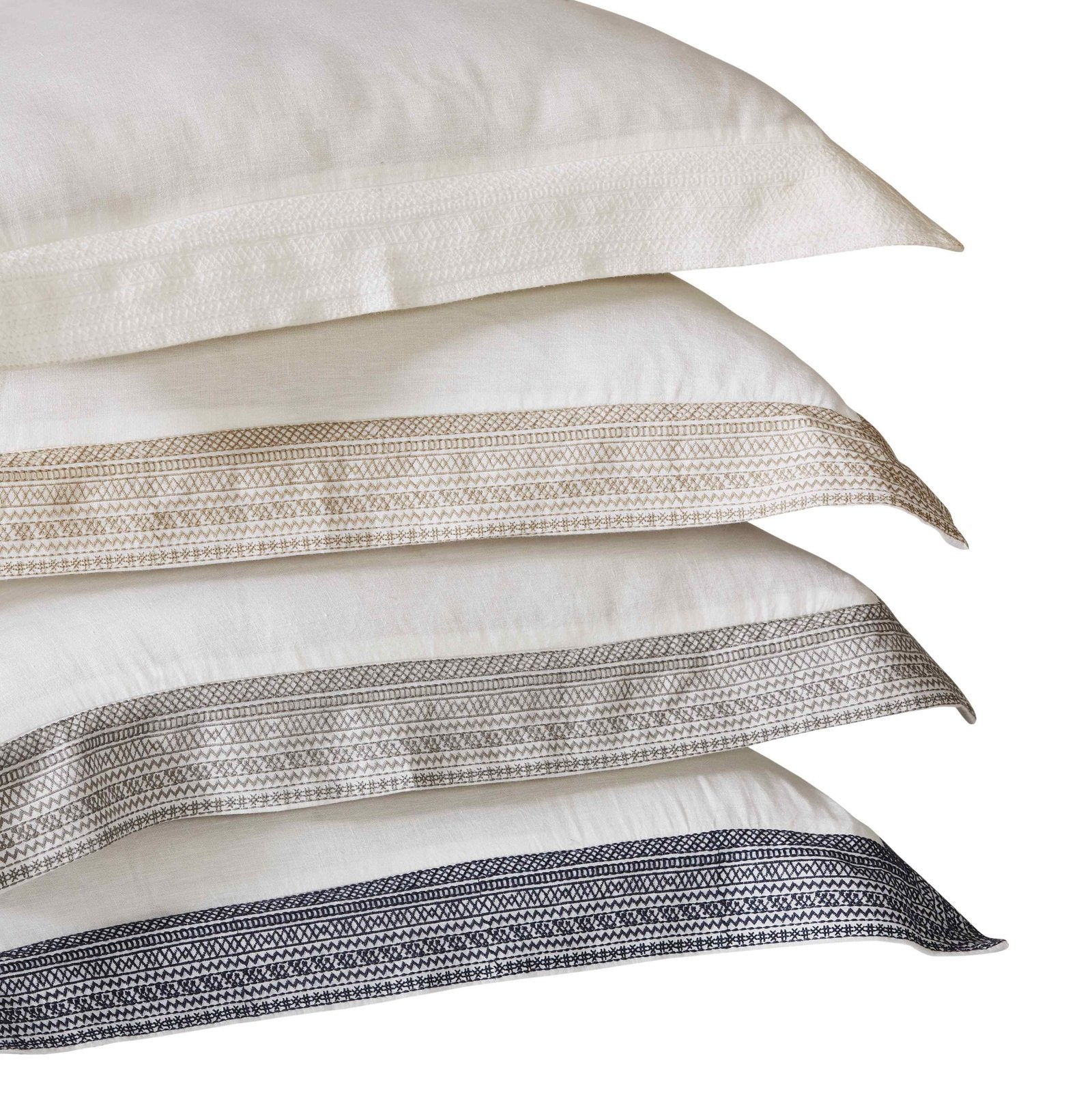 SS-015-X_2|Stack of elegant pillow shams featuring geometric embroidered borders, part of a sophisticated duvet cover collection.