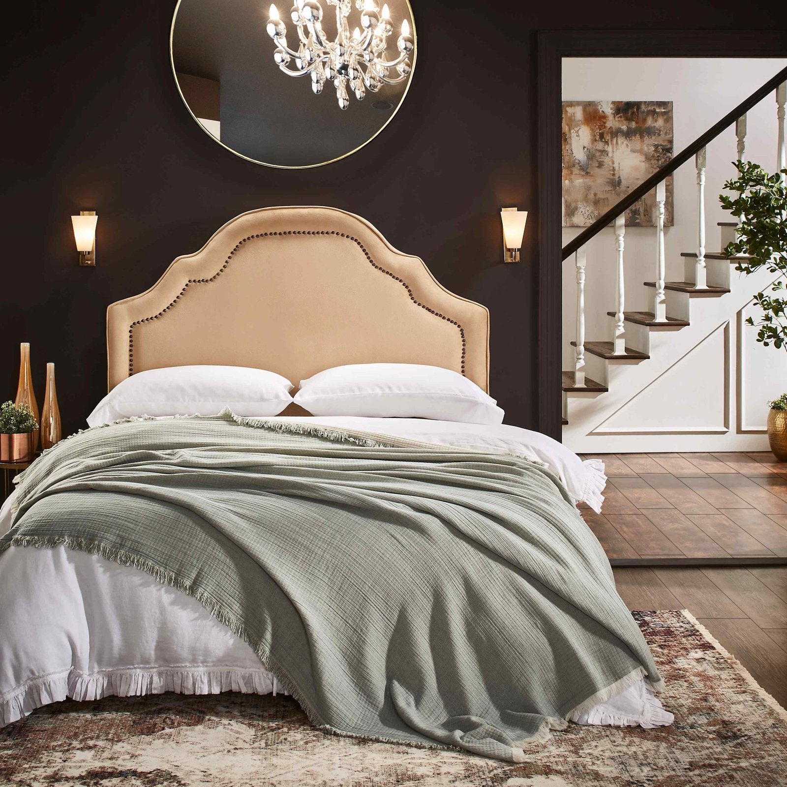 BT-109-9496_4|Chic sage green crinkled blanket with frayed edges casually draped over a bed, perfect for a cozy bedroom feel.