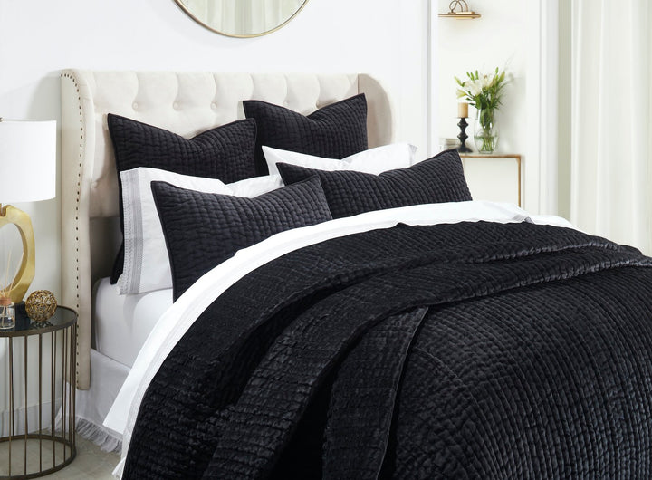 QT-361-9496_3|Close-up of opulent black quilted bedding, highlighting the soft textured quilt and matching shams for deep comfort.