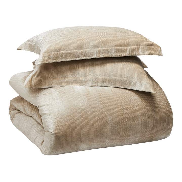 ES-053-2626_4|Stacked luxurious beige velvet ribbed duvet cover set including two shams, offering plush comfort and elegant style.