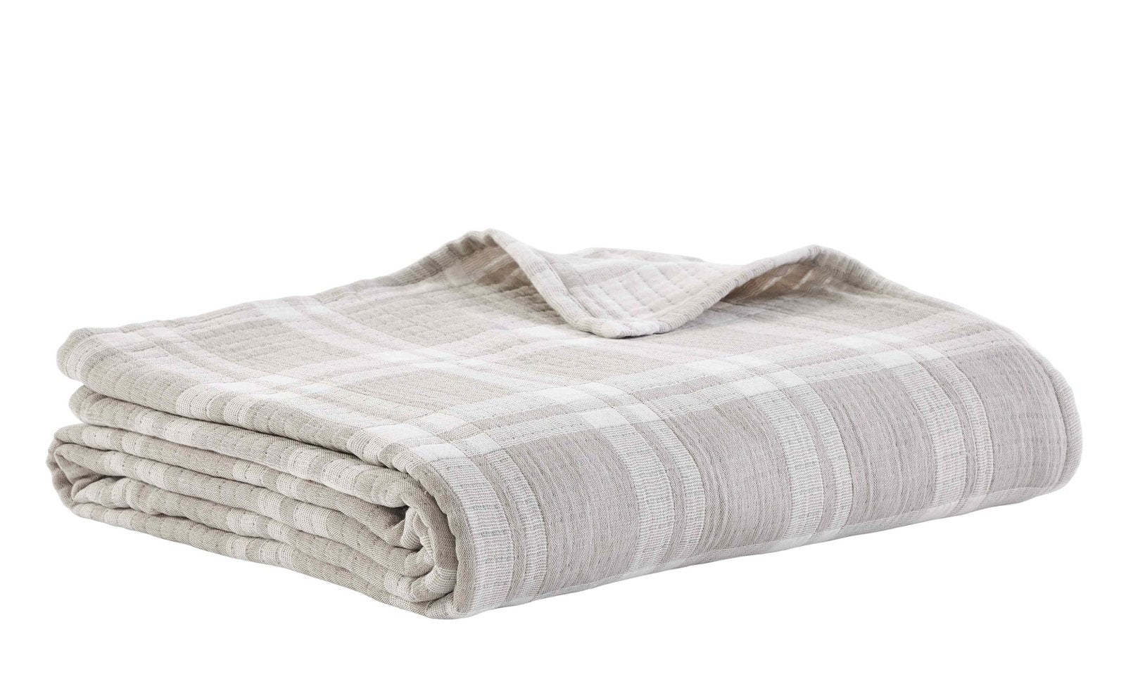 BT-120-11096_3|Neatly folded beige and white plaid quilted blanket, showcasing its soft texture and inviting design for comfort.