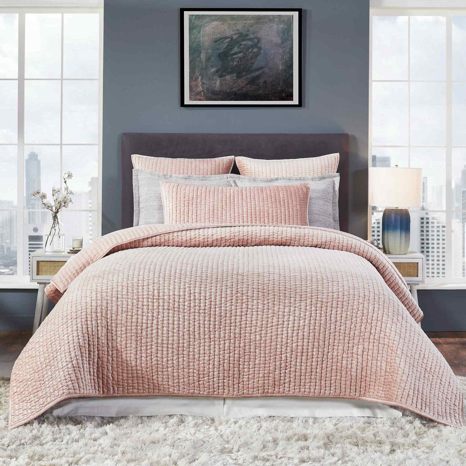 QT-354-9496_3|Luxurious dusty pink velvet channel-quilted quilt and pillow shams on a bed. Cozy, stylish bedroom decor.