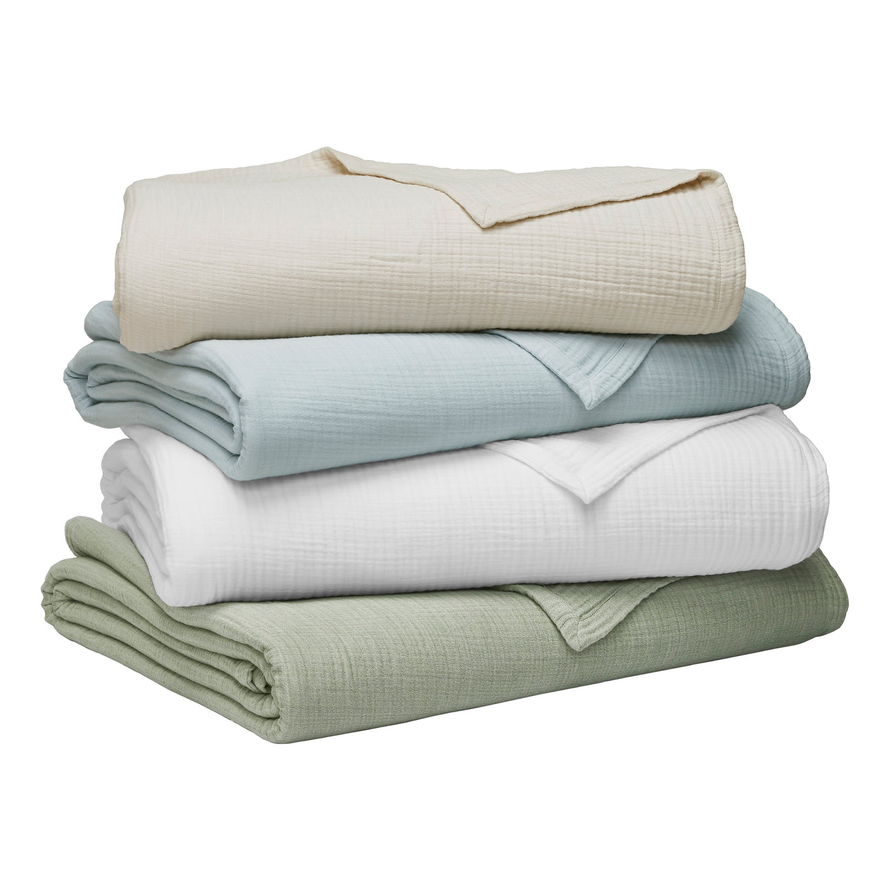 BL-861-X_2|Stack of four soft, textured cotton blankets in cream, light blue, white, and sage green, perfect for diverse home decor.