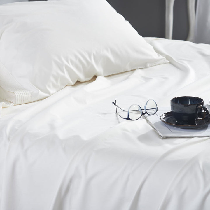 KSS-522-7880_3|Creamy white 100% cotton sheets with subtle pleated detail, offering luxurious comfort and sophisticated style.