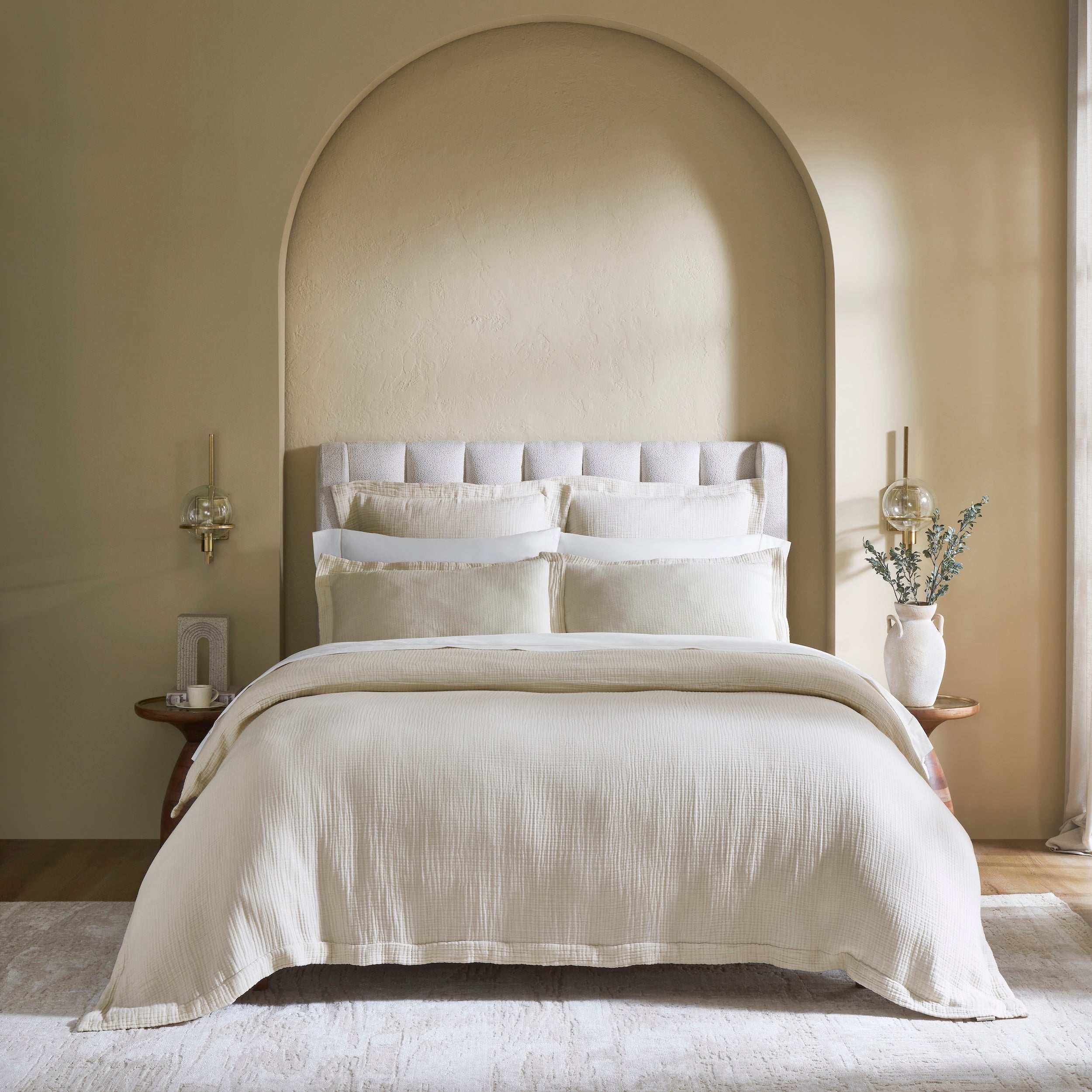 DT-049-10692_1|Elegant cream textured duvet cover adorning a luxurious bed, offering warm, serene, and inviting neutral bedding.