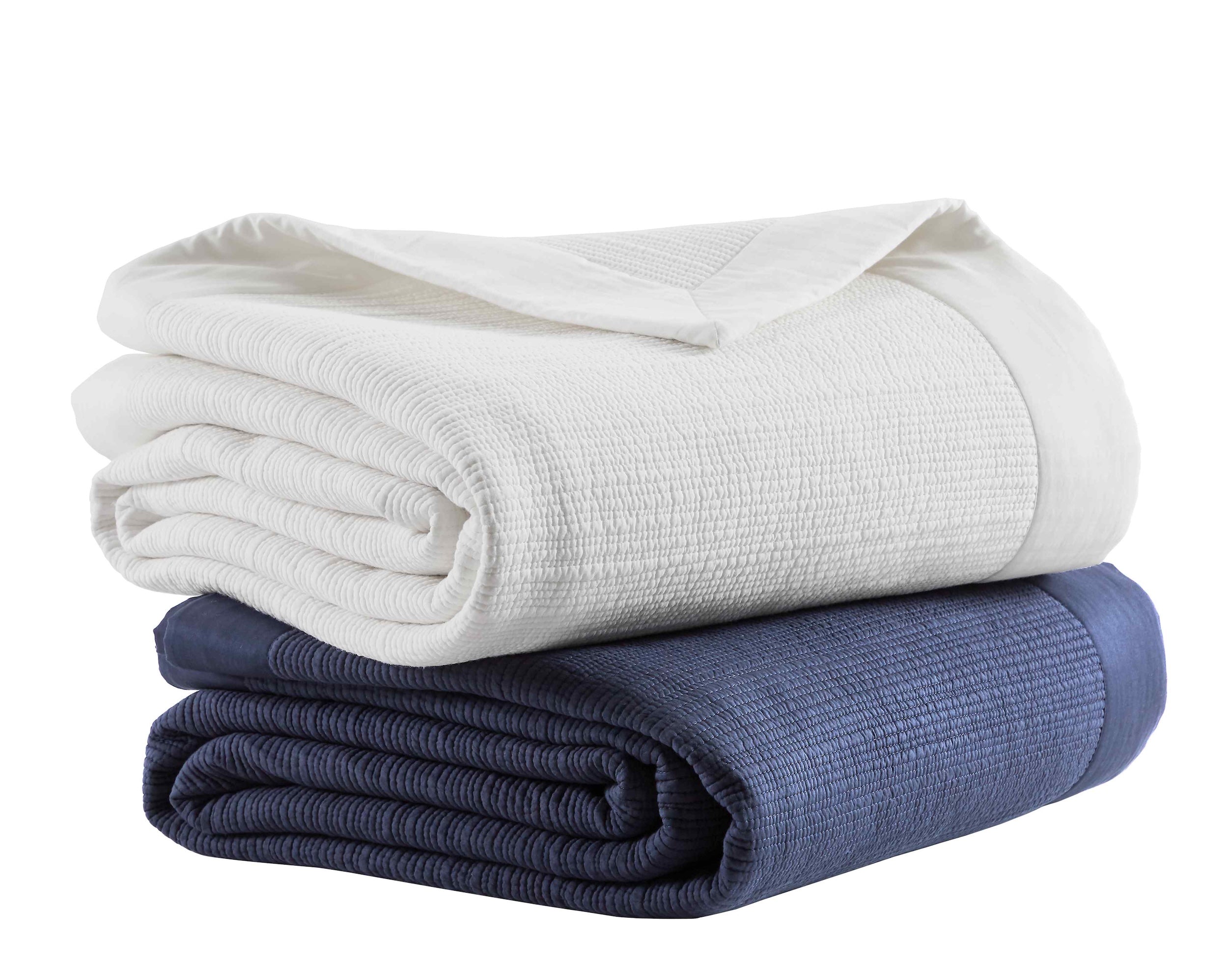 CL-167-9496_5|Stacked navy blue and white textured coverlets, versatile and essential bedding options for any modern bedroom.