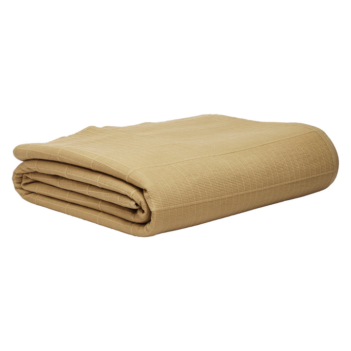 CL-269-11096_10|Folded tan coverlet featuring a distinctive grid-like textured pattern, ideal for versatile bedroom layering.