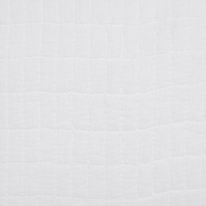 SWT-372-7.8_1|Bright white textured fabric with a distinct quilted square grid pattern, enhancing comfort in home furnishings.