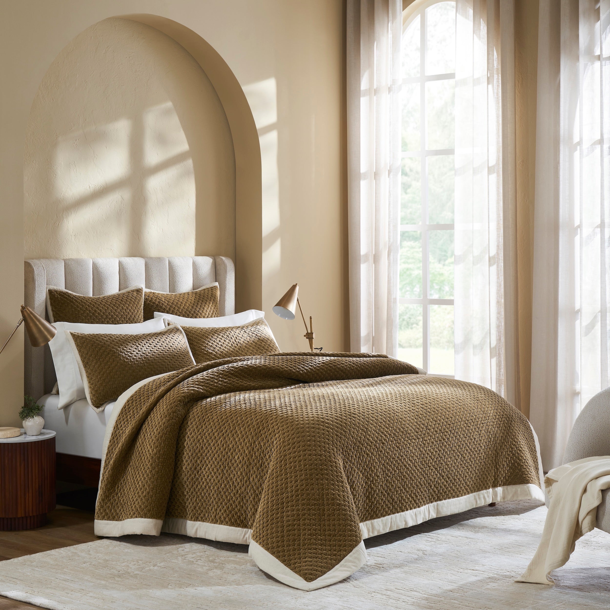 QT-378-11096_3|Luxurious golden-brown quilted bedspread with matching shams and pillows, featuring a textured design and cream trim.