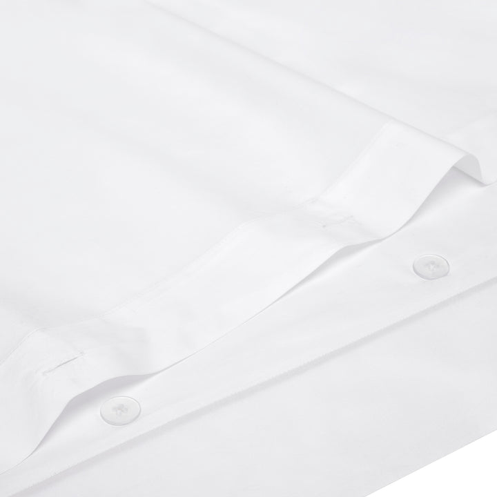 DT-058-9092_5|Close-up of crisp white pure cotton duvet cover with elegant button closure detailing, showcasing premium fabric.