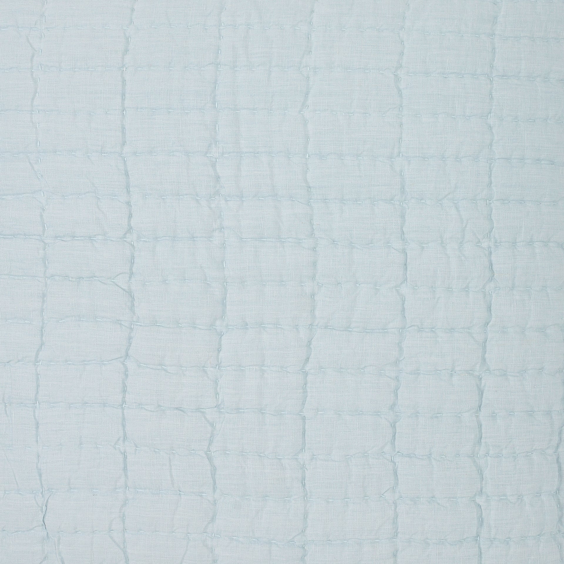 SWT-372-X_1|Light blue quilted fabric with a serene square pattern and soft textured finish, ideal for calming and breathable bedding textiles.