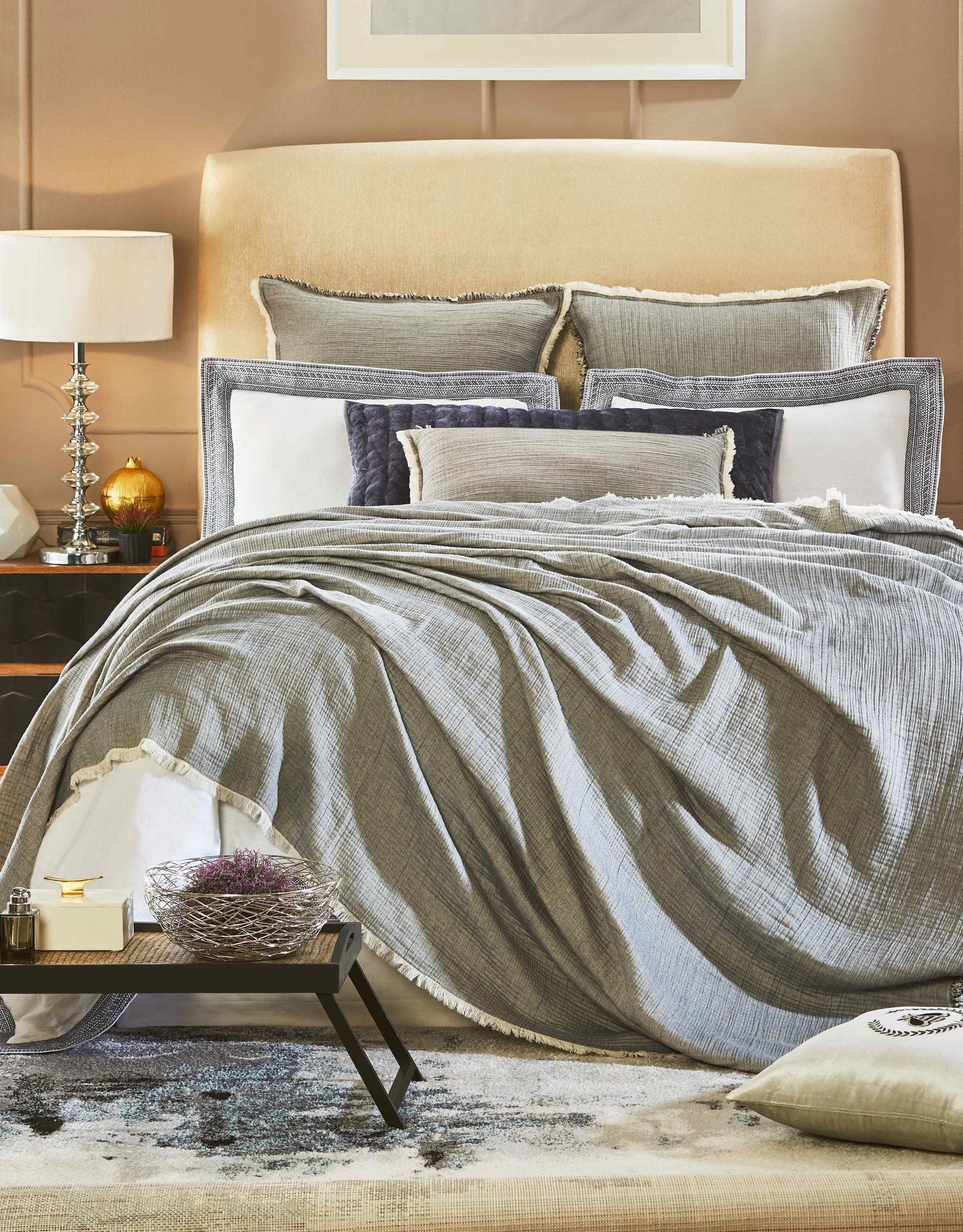 BT-104-9496_4|Luxurious gray fringed blanket on a styled bed, adding cozy warmth and modern elegance to any bedroom decor.