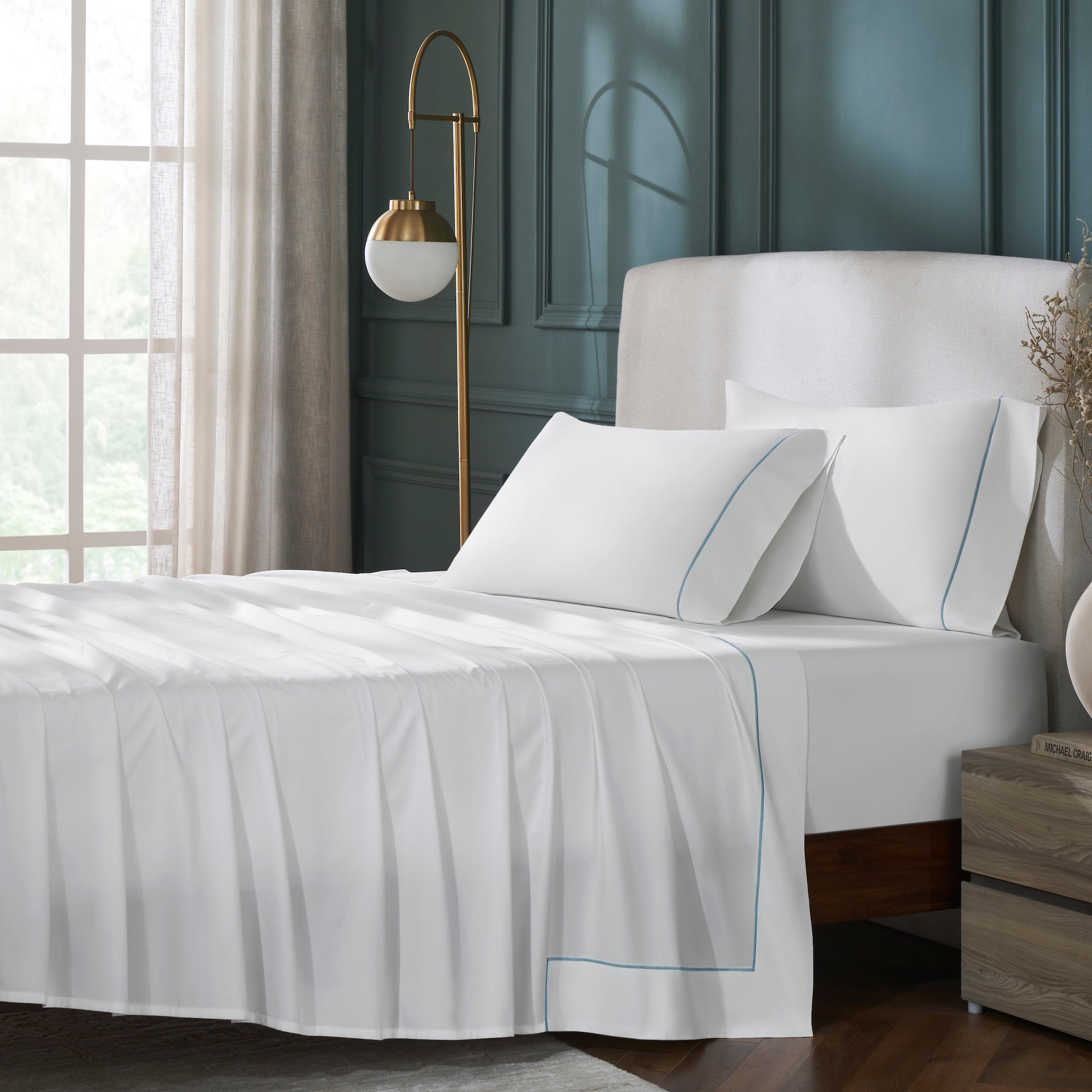 TFL-530-3980_1|Luxurious 100% cotton white sheet set with elegant light blue piping, styled on a bed for a serene bedroom aesthetic.
