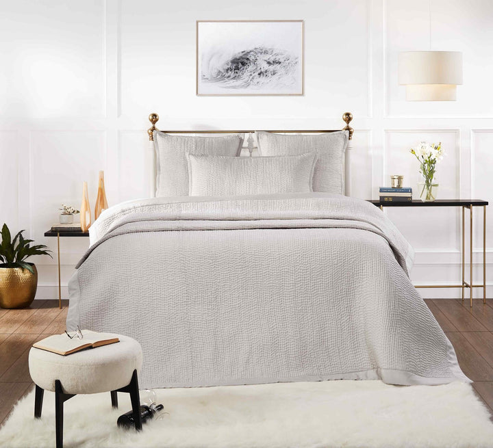 CL-166-9496_1|Light grey textured coverlet with matching shams on a luxurious bed, enhancing bedroom comfort and style.