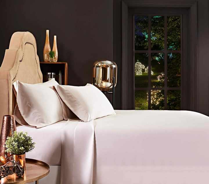 CSS-510-7284_5|Luxurious light pink 100% Lyocell sheets, providing silky soft comfort and breathable elegance for any bedroom.