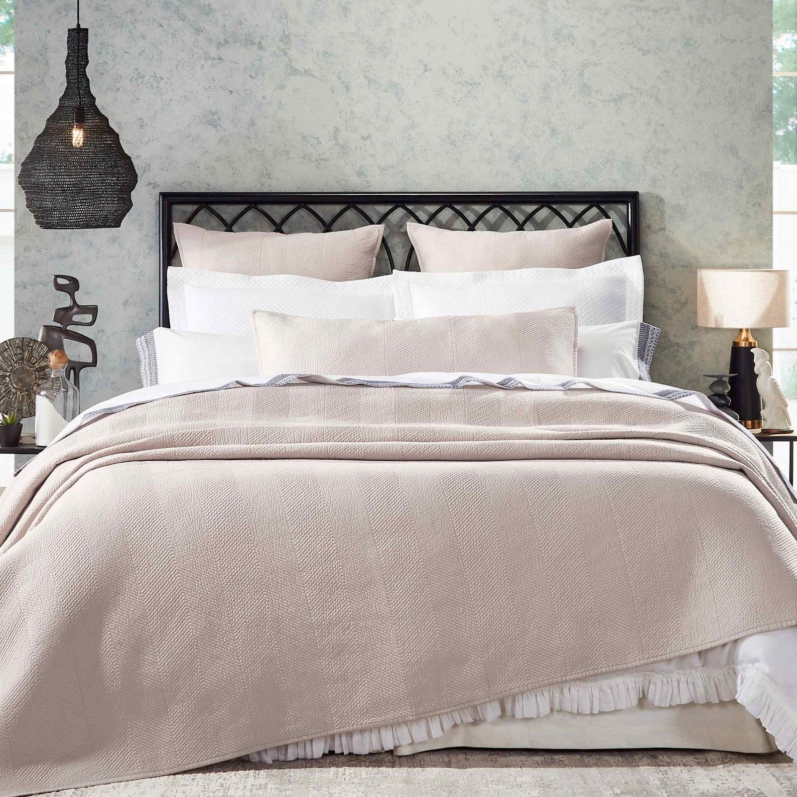 CL-170-X_1|Inviting neutral textured pillow shams beautifully complementing layered bedding for a cozy, elegant bedroom.