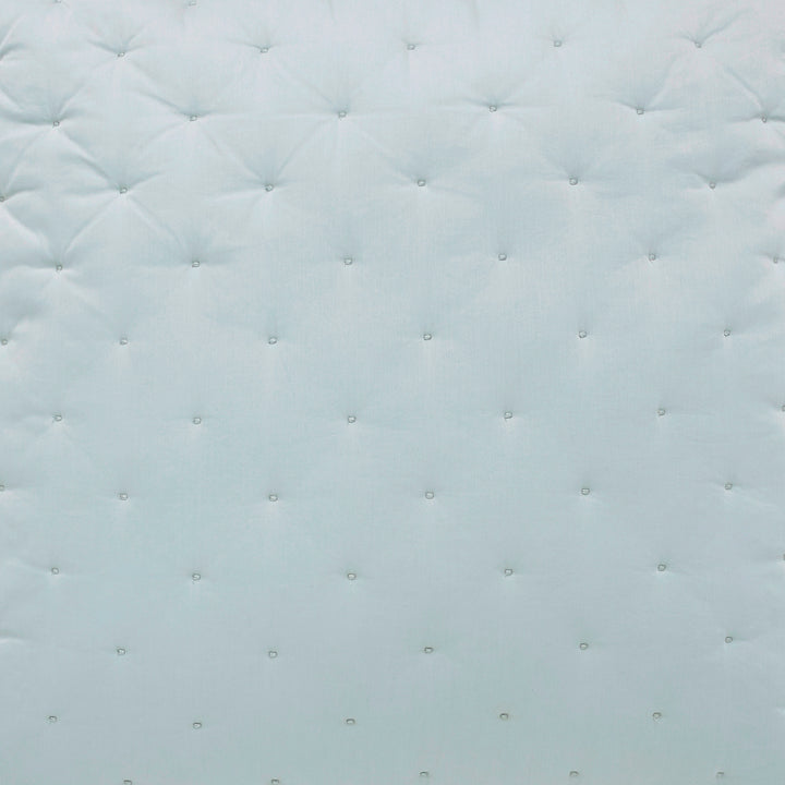SWT-351-7.8_1|Soft light blue quilted fabric with elegant tufted details, perfect for cozy headboards, decorative cushions, or chic benches.