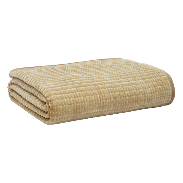 CL-267-9496_8|Folded beige velvet coverlet featuring soft channel quilting, ideal for adding a touch of luxury and comfort to any bed.