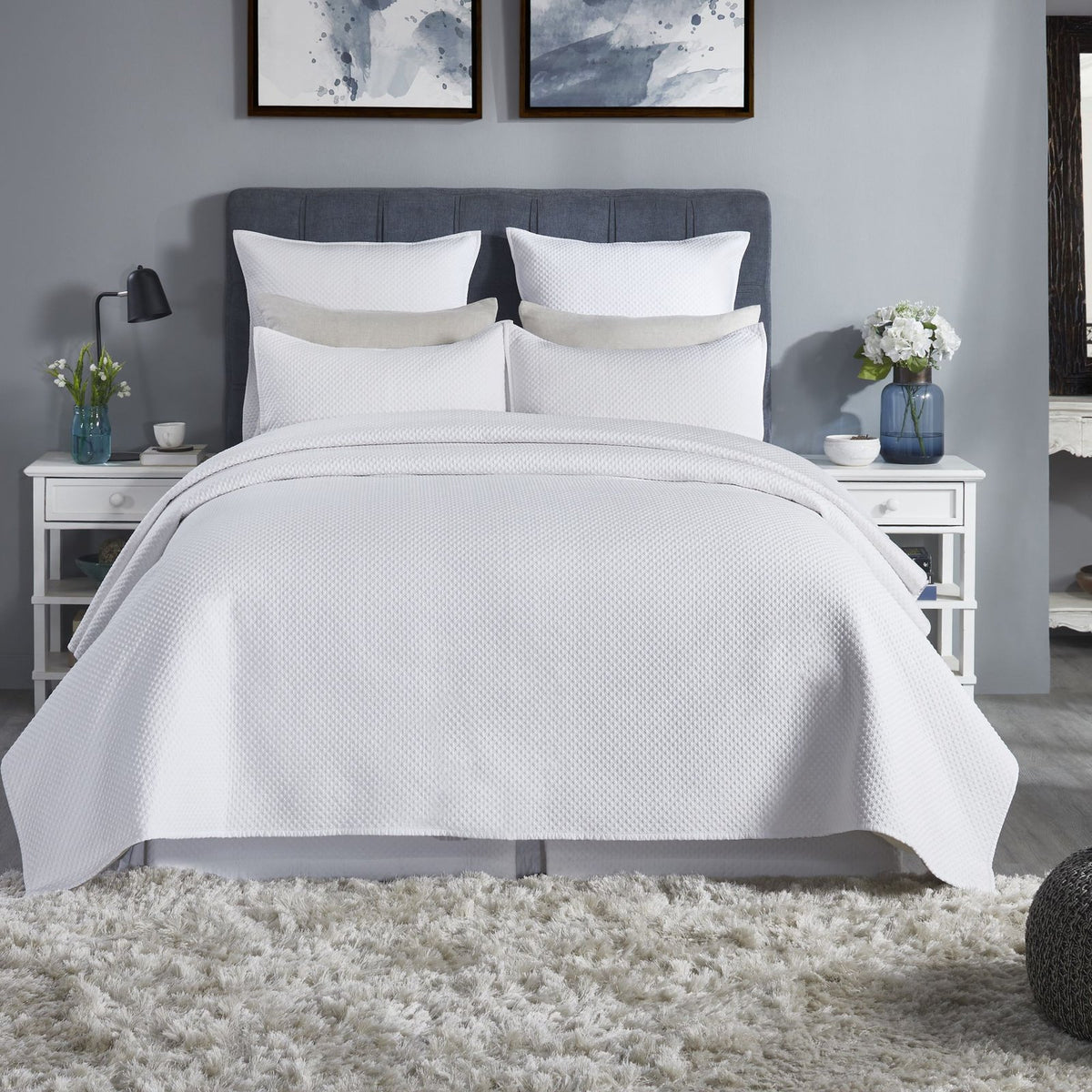 CL-200-9496_1|Crisp white textured coverlet beautifully drapes a queen bed, enhancing a serene, modern bedroom design.
