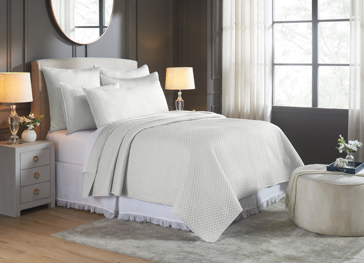 CL-266-11096_2|Serene bedroom showcasing a light gray diamond quilted coverlet with matching pillows. Luxurious and sophisticated bedding for comfort.