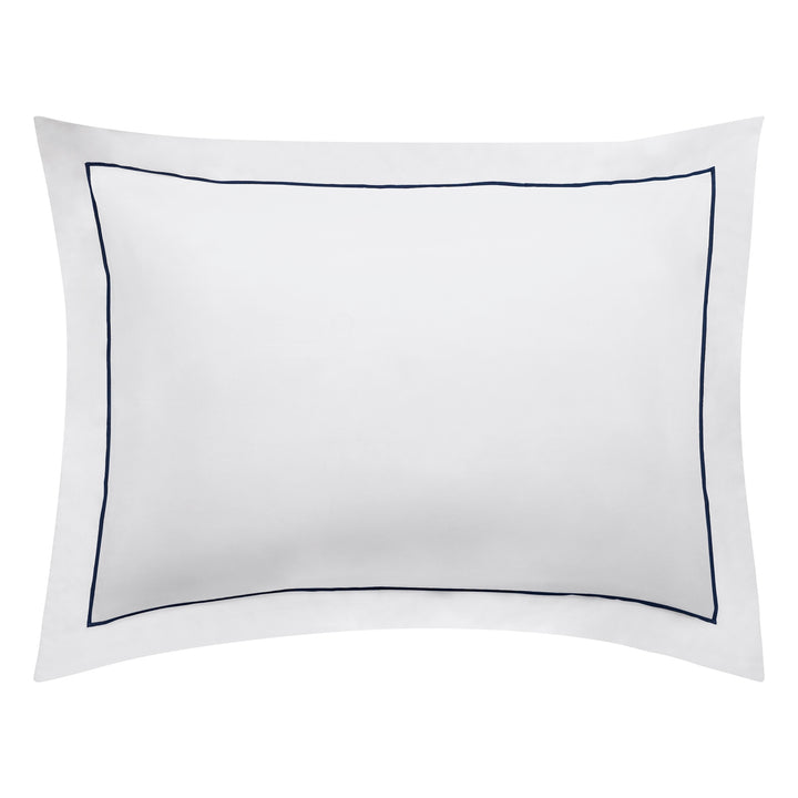 SS-070-2026_1|Elegant white duvet cover with crisp navy blue piped border, luxurious bedding for a sophisticated bedroom aesthetic.