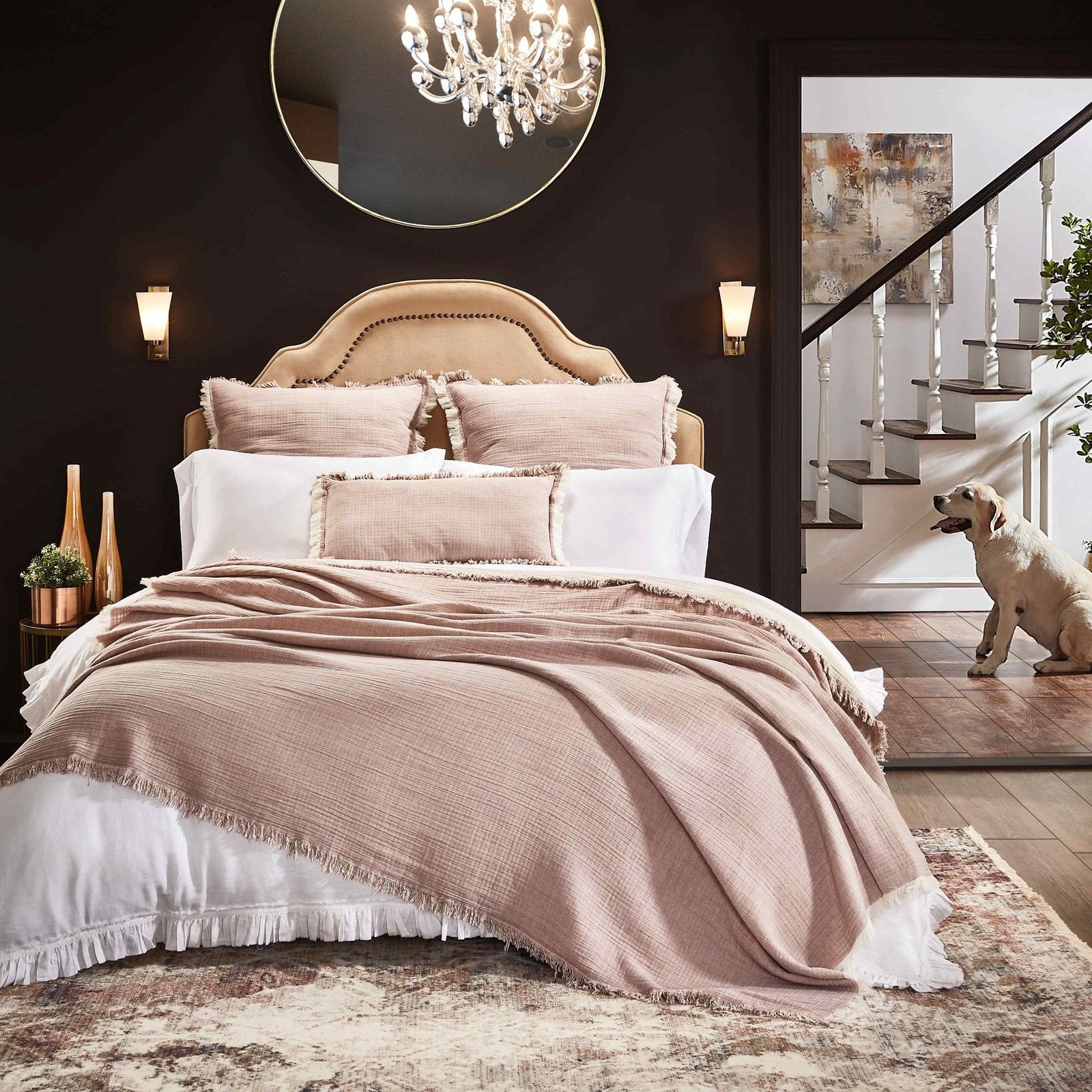 BT-110-9496_5|Blush pink textured cotton blanket with delicate fringe draped over a king bed, enhancing cozy bedroom decor.