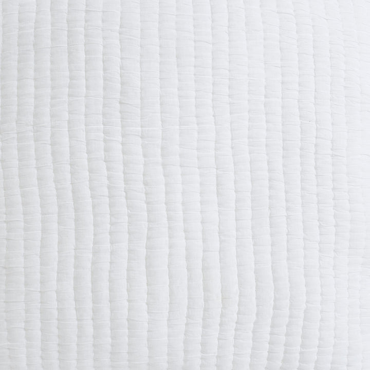 QT-359-9496-LOT1_9|Detailed close-up of a white textured quilt with linear stitching, showcasing soft, breathable cotton fabric for comfort.