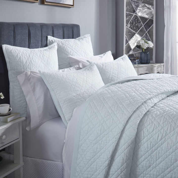 CL-255-11096_3|Inviting light blue quilted coverlet and matching pillows, showcasing a beautiful diamond pattern for a serene bed.