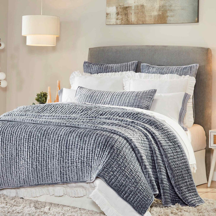QT-340-11096_1|Soft light blue velvet quilt featuring a contemporary textured pattern, draped elegantly over a bed, adding serene comfort.