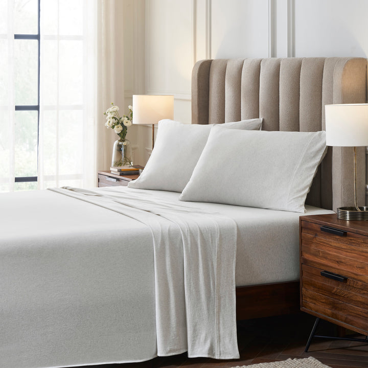 CSS-525-7284_3|Soft heathered grey 100% cotton sheets on a plush bed, creating a relaxed and cozy bedroom feel. Breathable for comfort.
