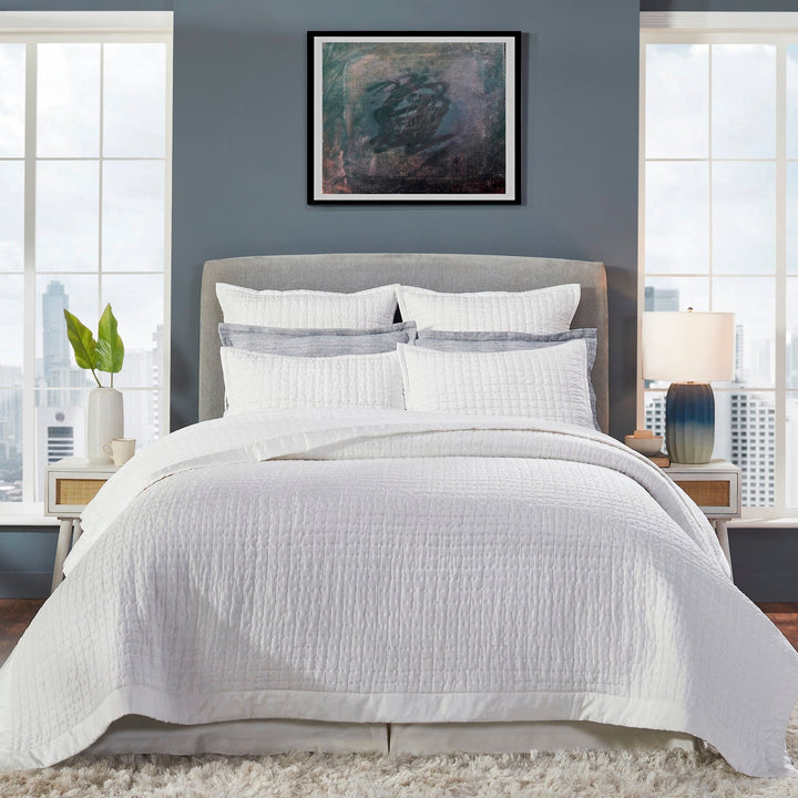 CL-176-9496_1|White channel quilted coverlet for a modern bedroom. Soft and cozy bedding, perfect for a serene and inviting sleep space.