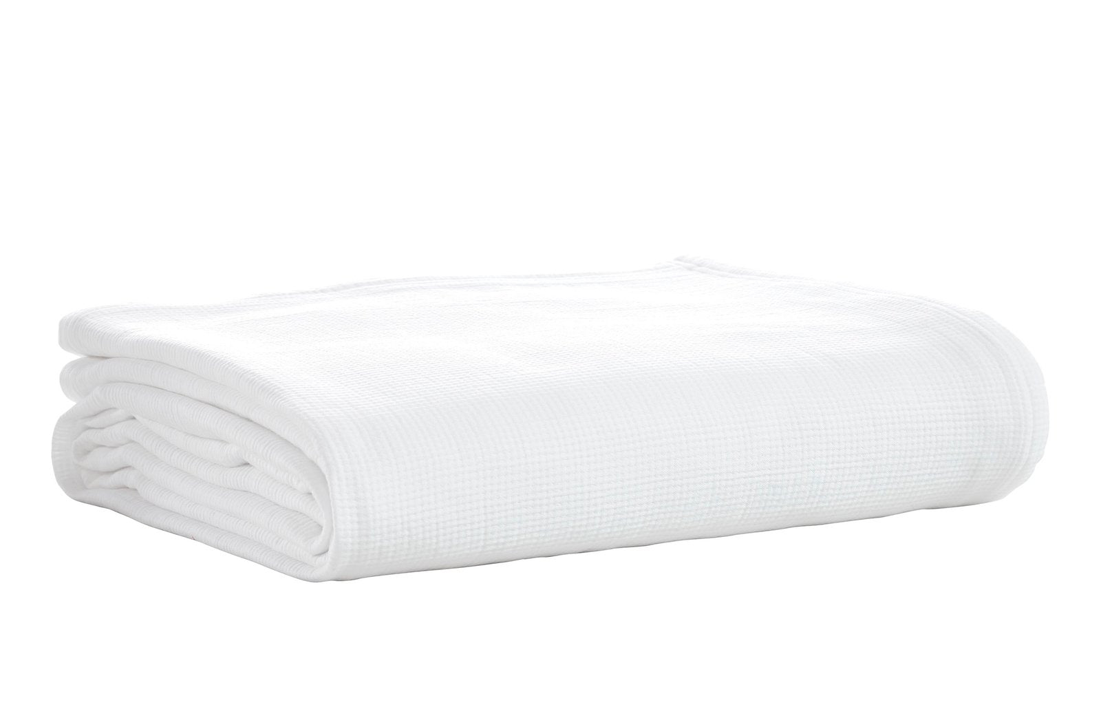 BL-858-11096_7|Freshly folded clean white waffle weave blanket. Offers ultimate comfort and lightweight warmth for any season.