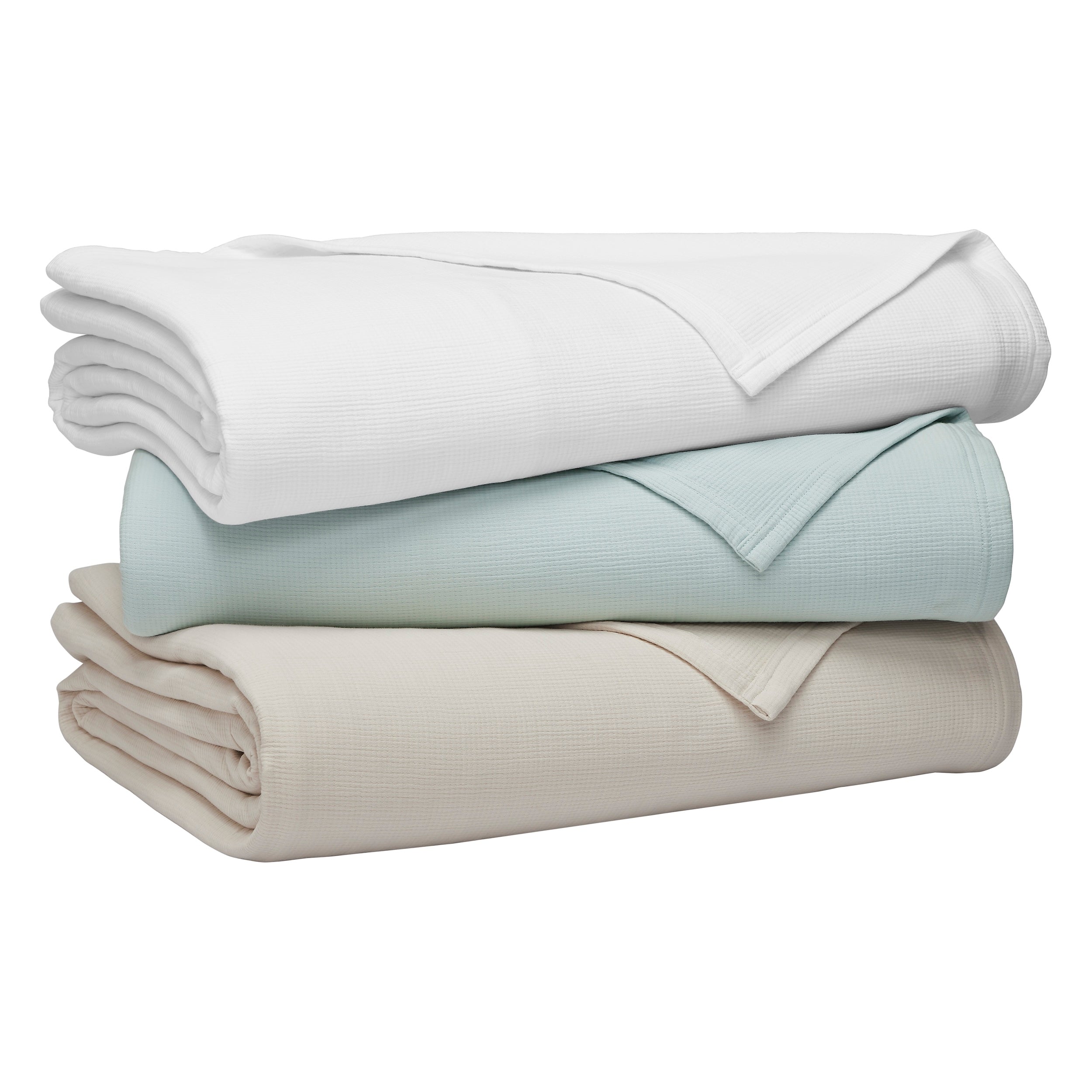 BL-858-X_2|Stack of three premium ribbed cotton blankets: white, light blue, and beige, offering soft texture and comfort.