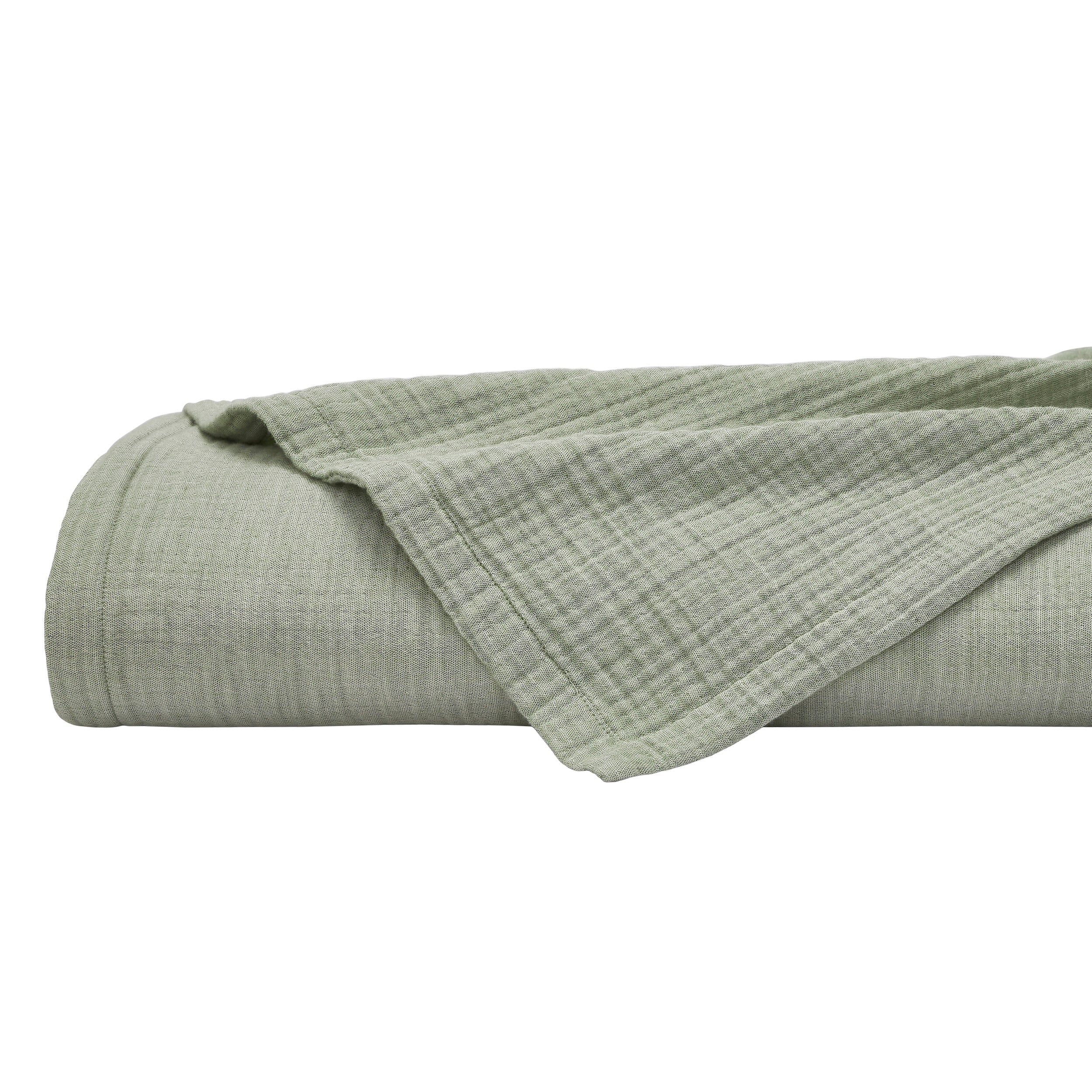 BL-864-11096_6|Rolled sage green textured blanket, showcasing its soft woven fabric and inviting texture, perfect for cozy comfort.