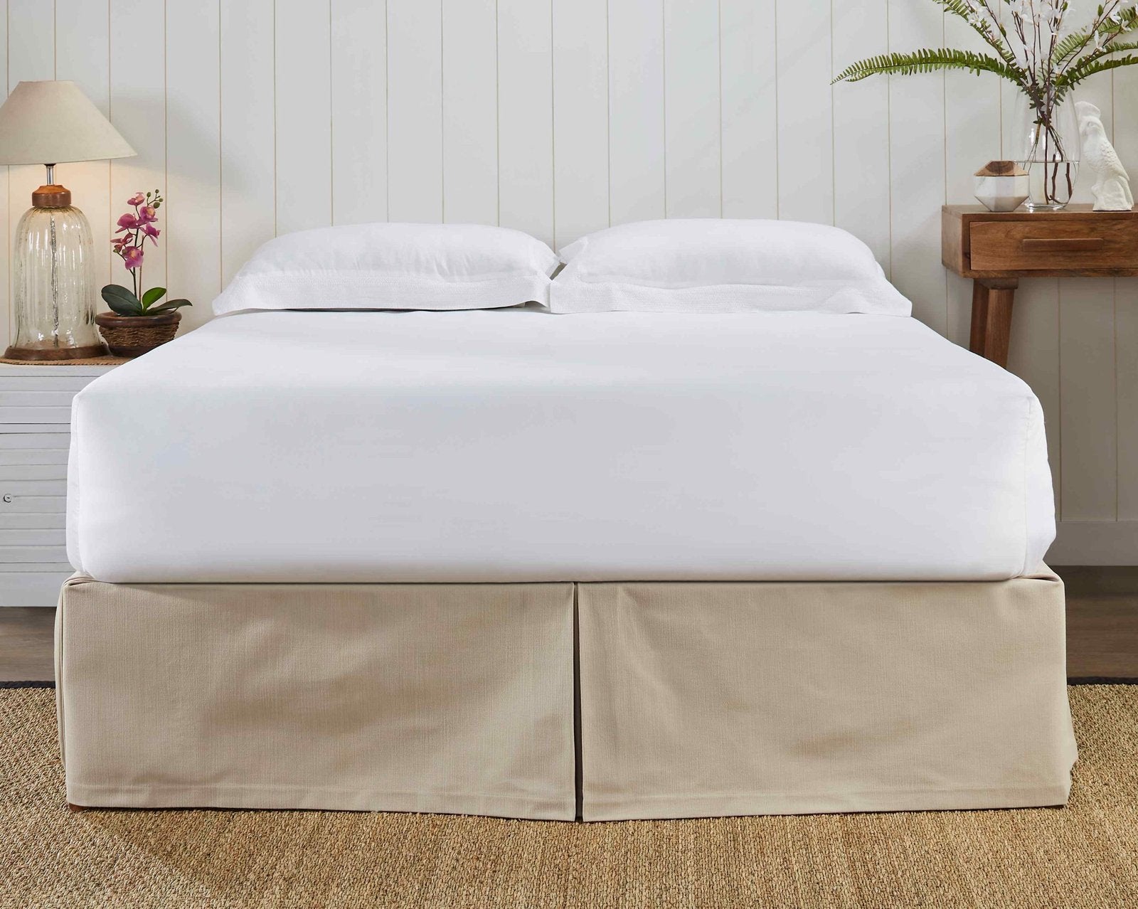 BS-109-7880_2|Light beige panel bed skirt featuring clean box pleats, providing a sophisticated and neat look to any bedroom setting.