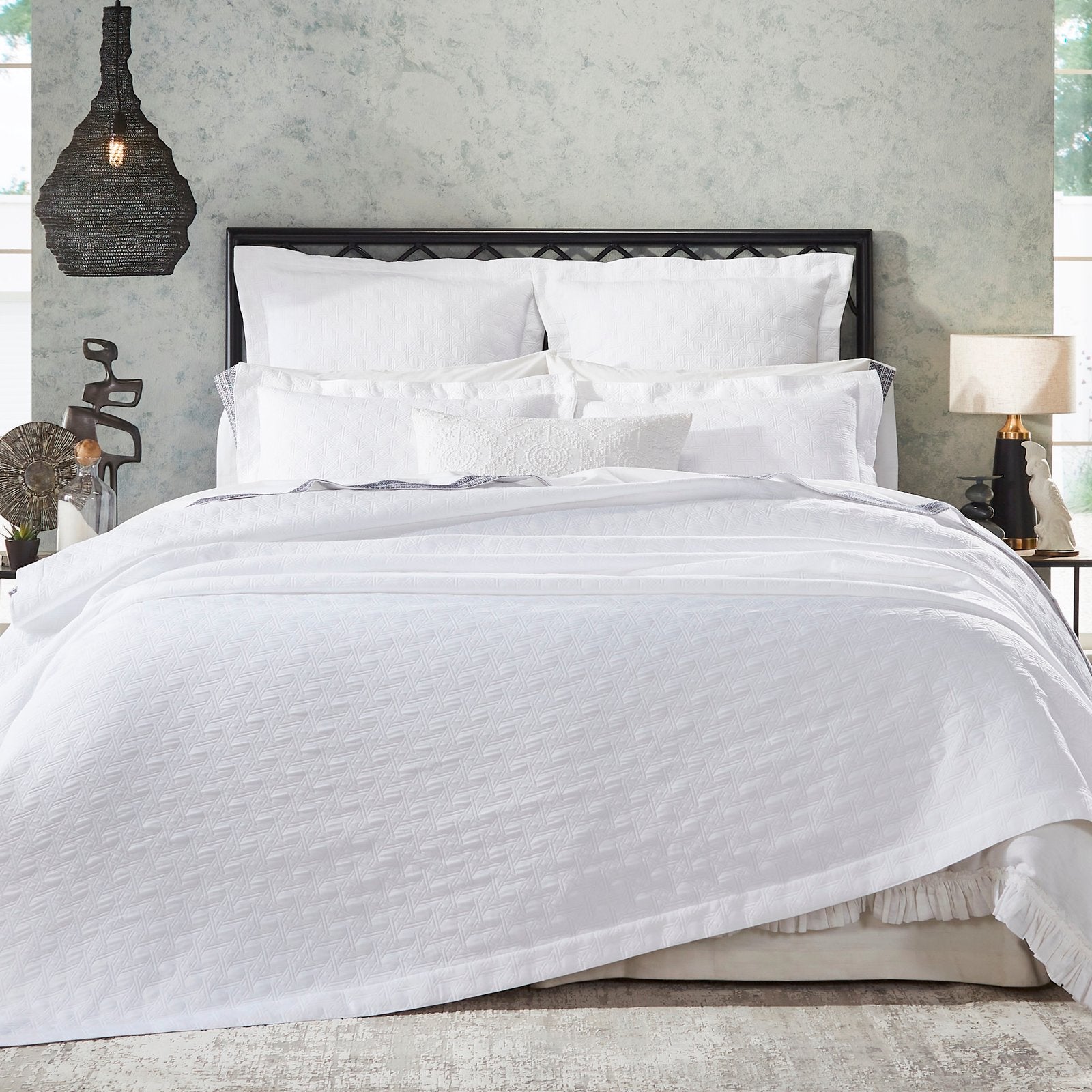 CL-175-X_1|Crisp white quilted Euro sham with a subtle geometric pattern, offering elegant texture and support for a serene bedroom decor.