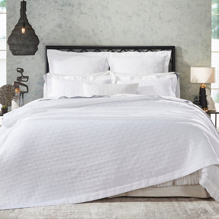 CL-175-X_1|Crisp white quilted Euro sham with a subtle geometric pattern, offering elegant texture and support for a serene bedroom decor.