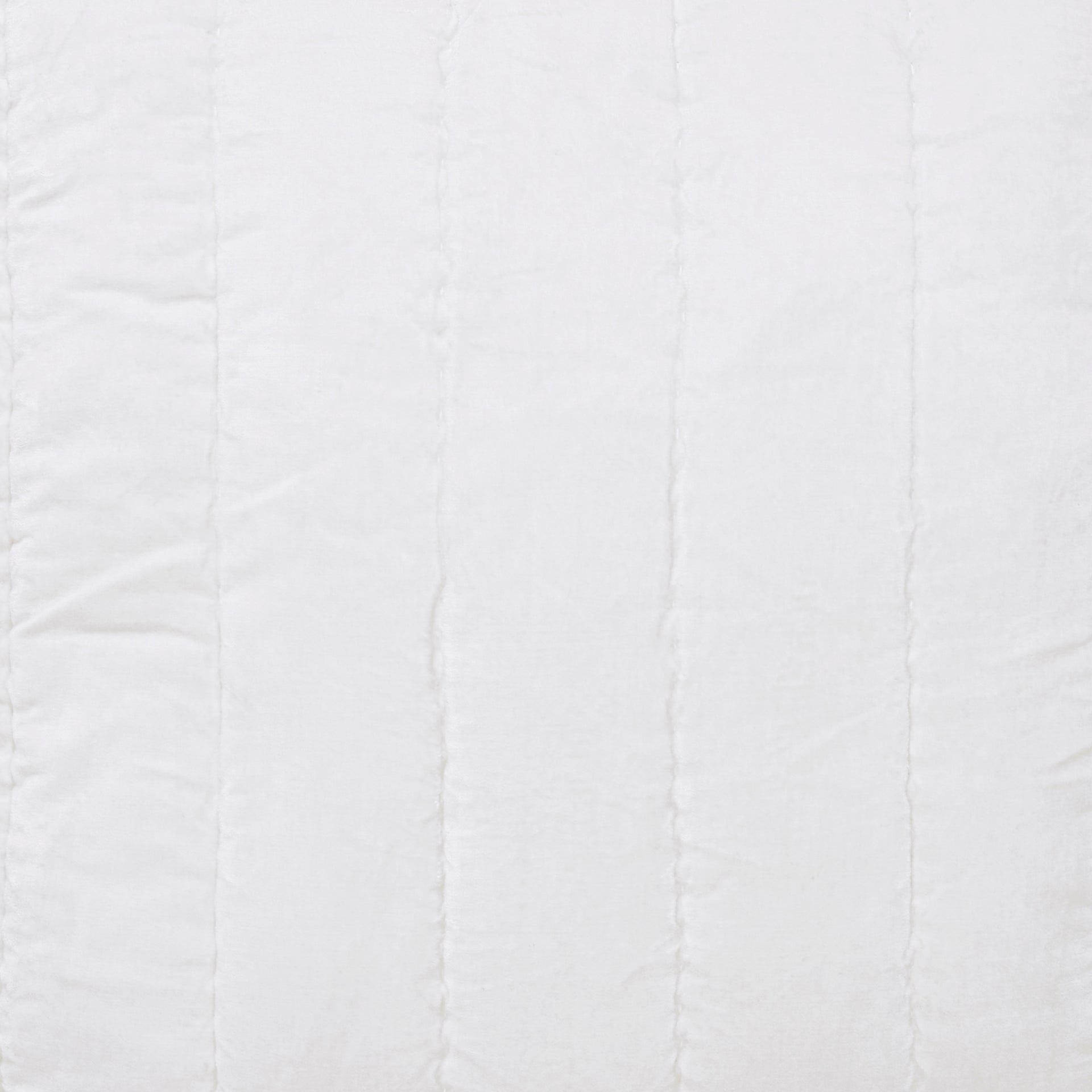SWT-337-X_1|Crisp white quilted bedspread featuring elegant vertical channel stitching. A minimalist and plush bedding essential for modern homes.