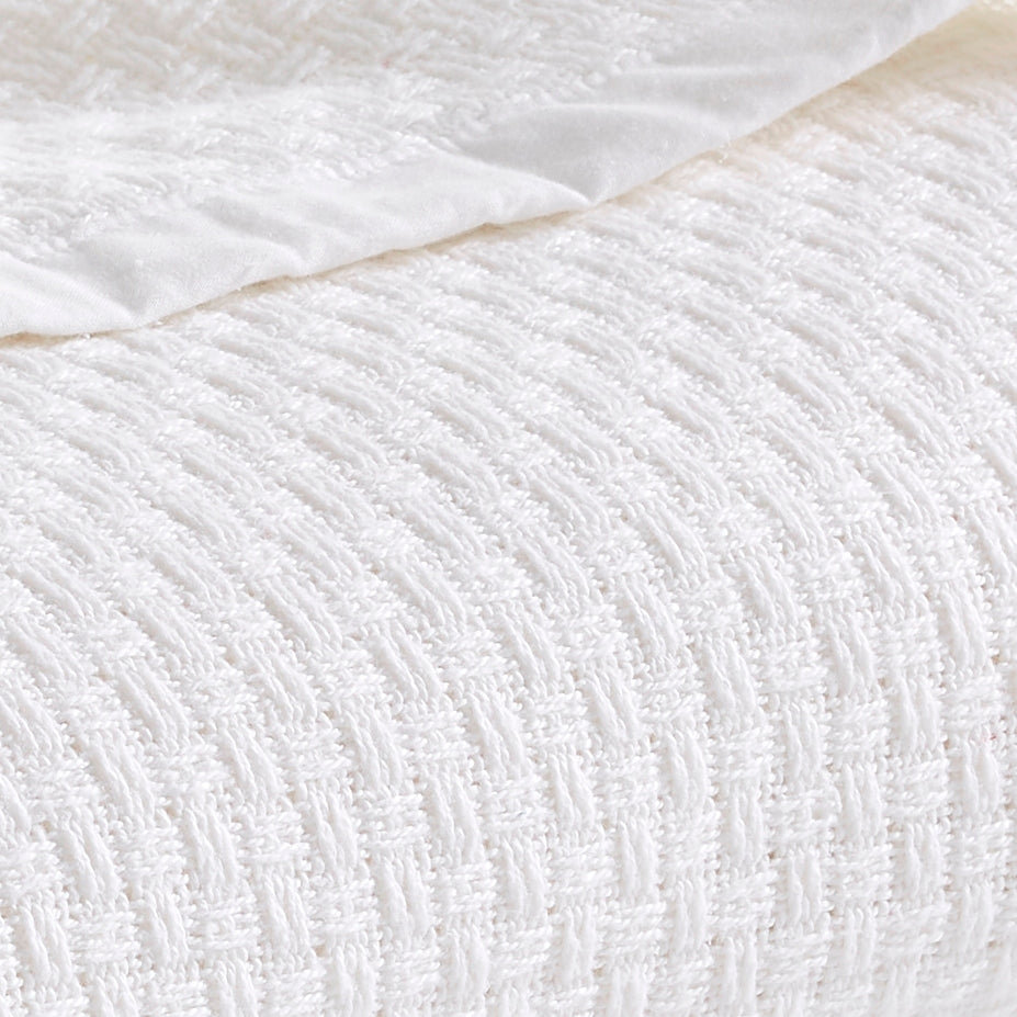 SWT-852-7.8_1|Soft white woven blanket with a distinctive basketweave texture, ideal for breathable throws, cozy layers, or comfortable bedding.