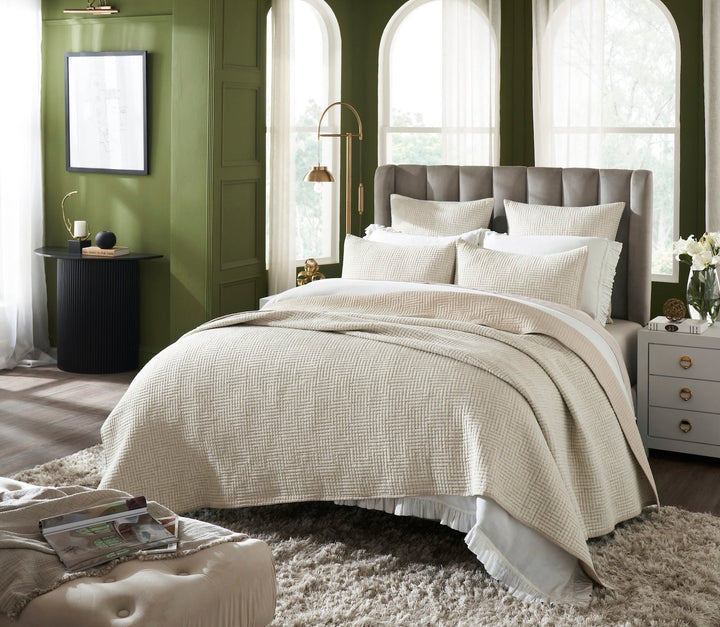 CL-259-9496_2|Cream textured geometric pattern coverlet neatly draped on a bed, enhancing the cozy and stylish bedroom decor.