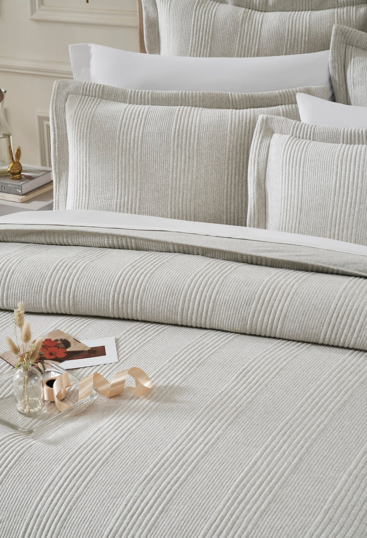 DT-044-10692_4|Detailed close-up of luxurious light grey ribbed textured duvet cover and matching shams, perfect for a cozy modern bedroom.